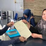 Serahkan Sertipikat Roya, Perwakilan Kantah Batu Bara Tegaskan Komitmen Layanan Prima